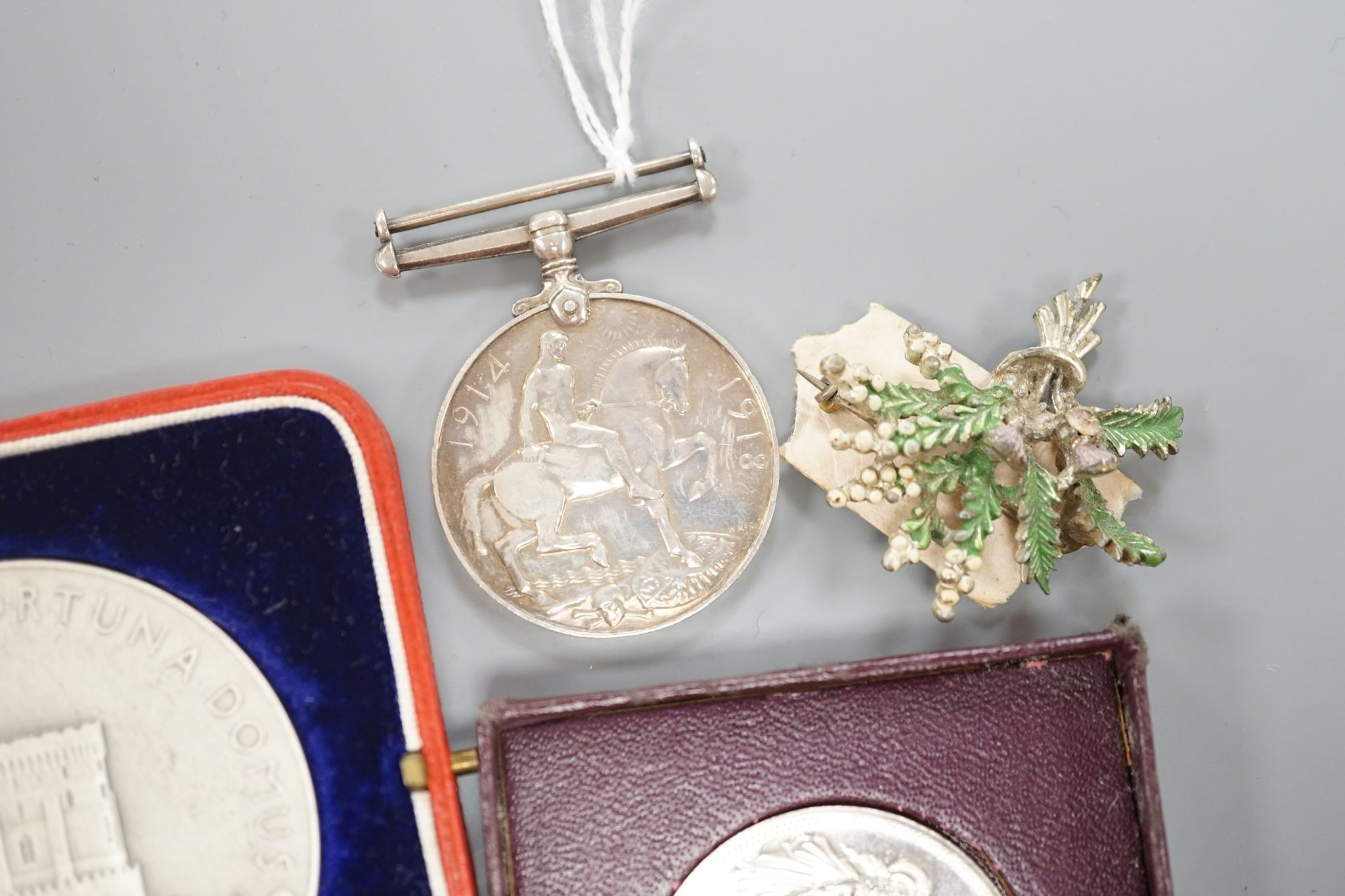 Badges, medals etc. to include a great war medal 268400 PTE. W. DRIVER. WORC. R., a George V and Queen Mary silver jubilee medal, cased and a third Reich badge